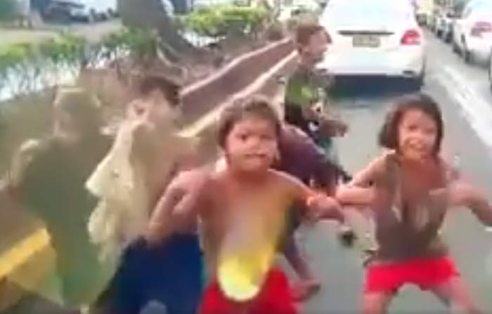 dancing-street-children-while-traffic-cebu.jpg